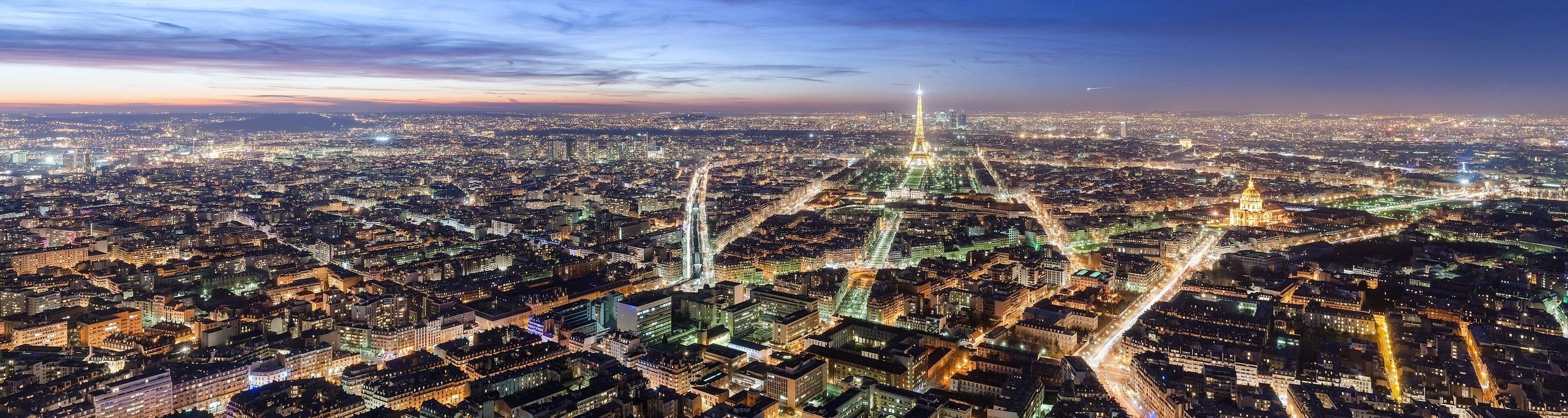European city lights at dusk